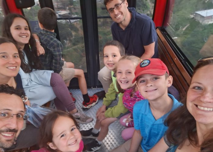 Laura's cousin, Amaris Allan, her husband, Stuart, and their children are pictured with the Sharp family on a cable car overlooking El Paraíso in south Bogotá on June 14, 2026. Their relatives were visiting from Pennsylvania. Photo by Laura Sharp.