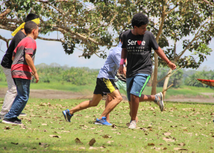 ​Biz Bomberger (right) plays soccer at a youth camp during his participation in a Youth Venture trip to Peru. Photo provided. 