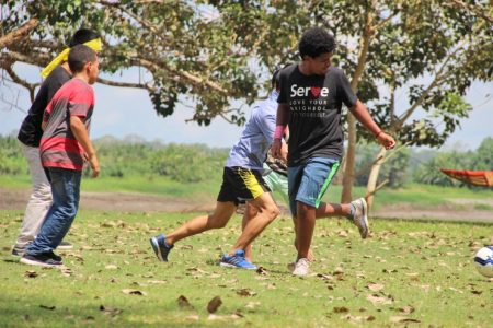 ​Biz Bomberger (right) plays soccer at a youth camp during his participation in a Youth Venture trip to Peru. Photo provided. 