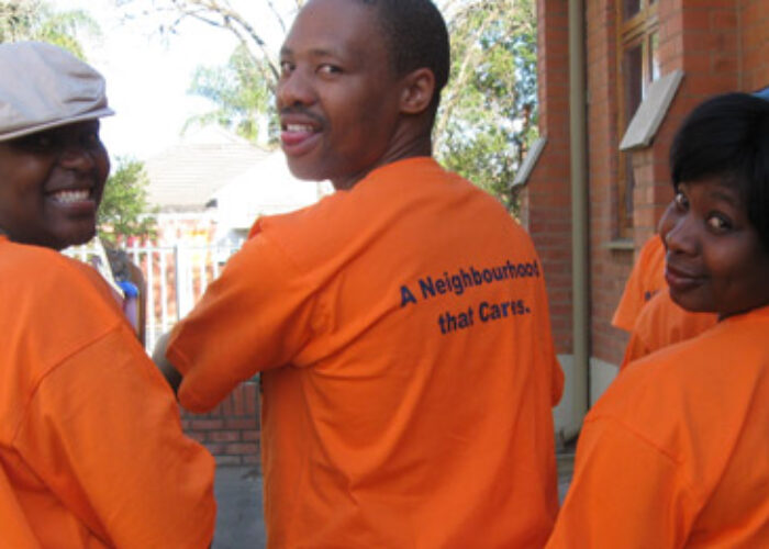 Breakthru church members show off shorts they wore during a listening intiative