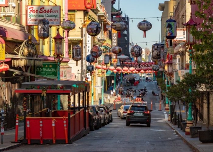 Grant Avenue in San Francisco's Chinatown, lined with shops and red paper lanterns strung overhead