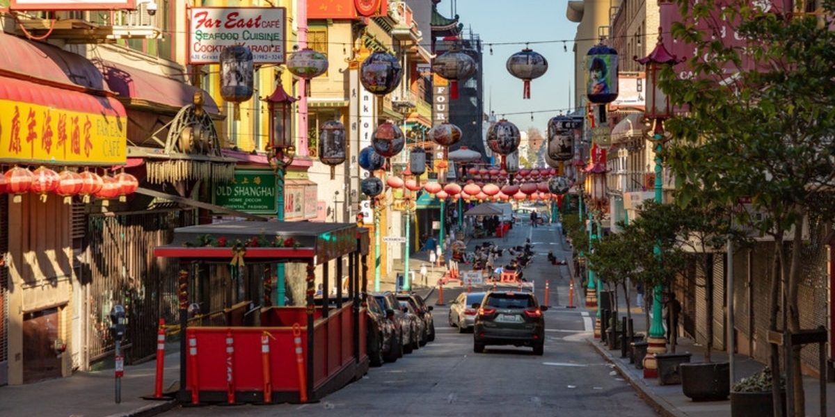 Grant Avenue in San Francisco's Chinatown, lined with shops and red paper lanterns strung overhead