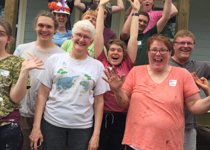 ​Service Adventure participants and leaders volunteered together working on home renovation in South Texas. From the left side of the front row to back row: Cynthia Neufeld Smith