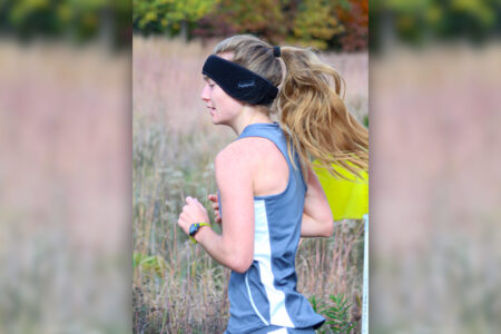 ​Teresa Ross Richer runs at the 2021 Indiana semi-state qualifier meet at Oxbow Park in Elkhart
