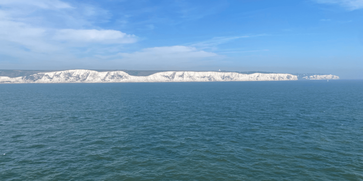 The famous white cliffs of Dover, as seen by the pilgrimage team from the ferry they rode from Calais to the United Kingdom. Photo by Shelby Rudy.