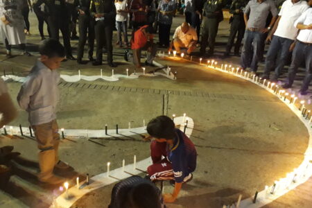 ​Little boys participate in a peace vigil held in Riohacha