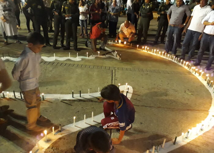 ​Little boys participate in a peace vigil held in Riohacha